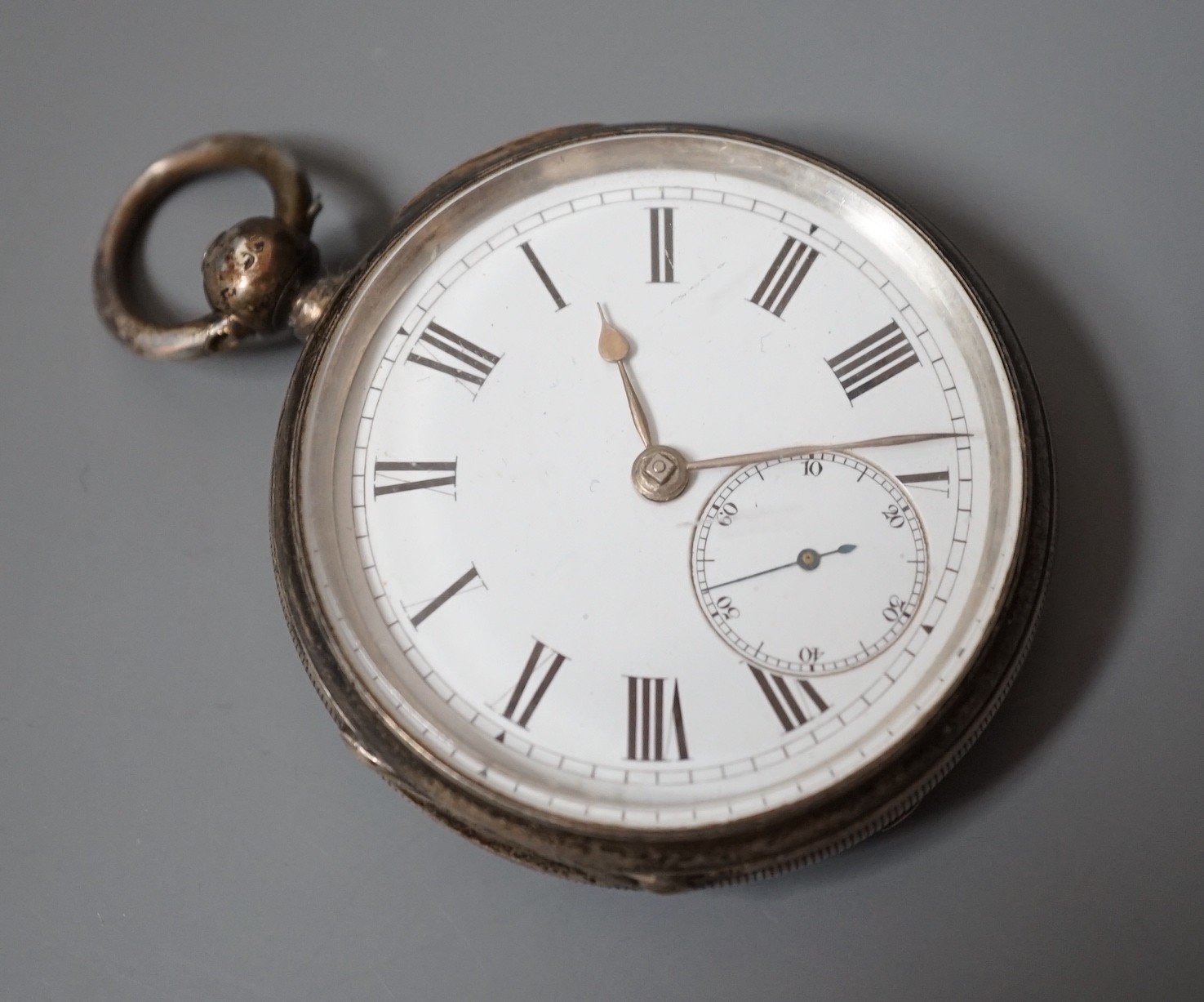 A late Victorian silver keywind open faced pocket watch, with Roman dial and subsidiary seconds.